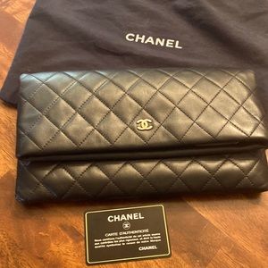 Gently used  Chanel fold over clutch.